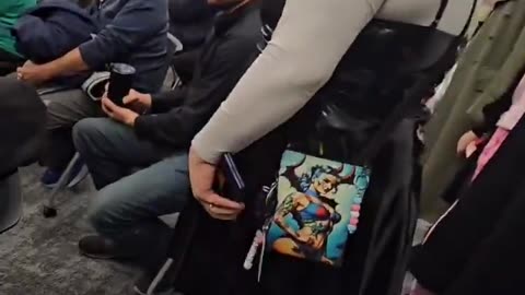 Obese men in dresses at Town Hall