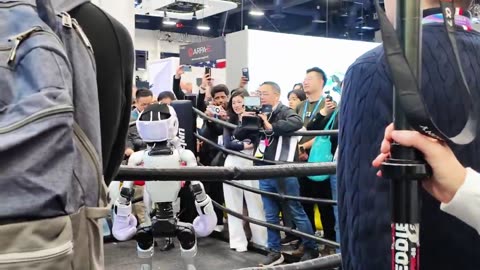 A 🇨🇳 Unitree robot at CES 2026… why is the operator hiding the remote control behind his back