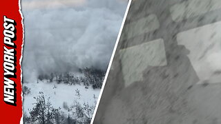 Terrifying moment avalanche slams train in the Swiss Alps
