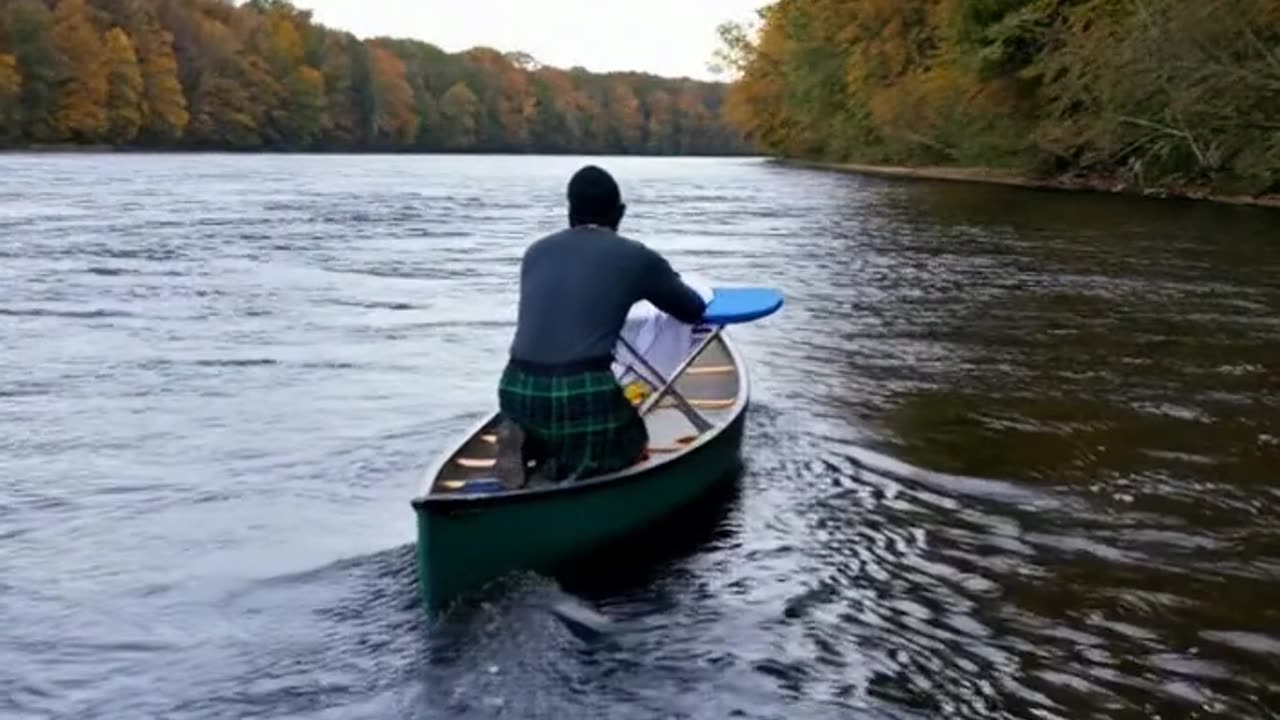 LEVI EXTREME IRONING IN A CANOE
