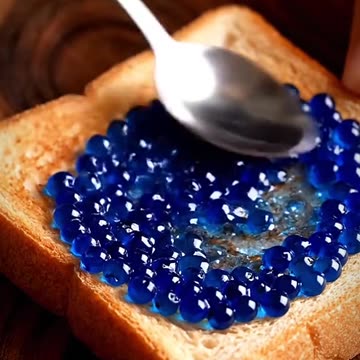 AI ASMR: Spreading blueberries onto toast #oddlysatisfying #pickone #asmrvideo #asmr