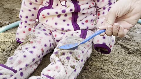 who needs a shovel when you have a spoon? 😂 baby kayla digging in the sand