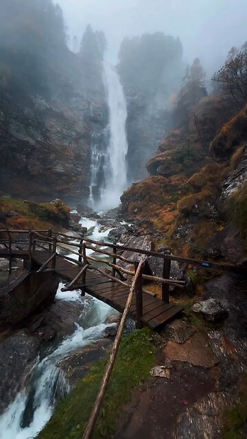 Breathtaking Waterfall Amid Majestic Mountains | Ultimate Nature Serenity”