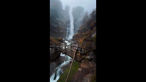 Breathtaking Waterfall Amid Majestic Mountains | Ultimate Nature Serenity”