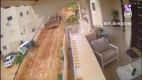 The israelis use bulldozers to illegally destroy Palestinian...