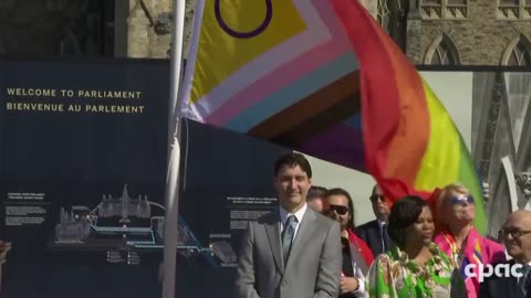 Justin Trudeau dancing around at a pride flag raising ceremony while Canada crumbles.