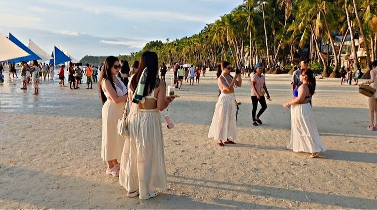 Having fun on a summer beach during the day in October 2025