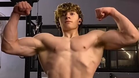 16 years old teen bodybuilder flexing muscles