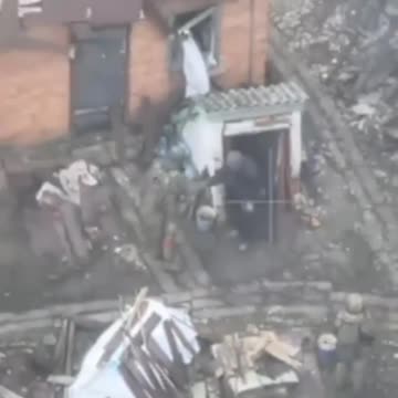 Russian soldier and local citizen in Seversk.
