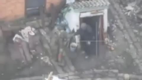 Russian soldier and local citizen in Seversk.