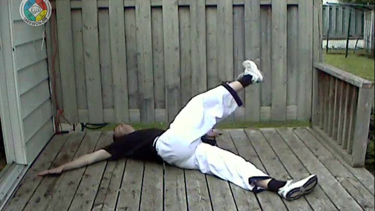 Warm-ups: 21-lieing-on-back-arms-out-90-degrees-leg-up-and-over-front-view