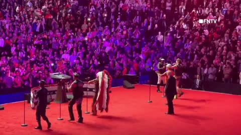 The Village People, the singers of YMCA, performing on stage with President Trump