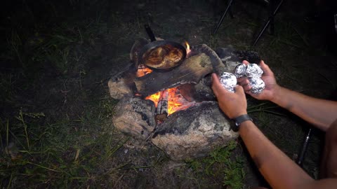 Camping adventure cooking in the wild