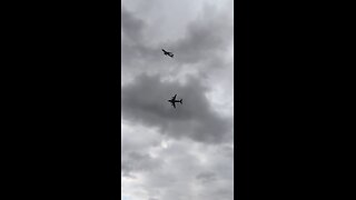 C-17 and Globemaster refueler flying over