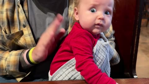 Concerned Baby Being Burped