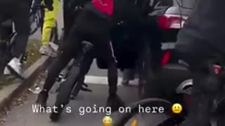 Terrified Mother drives off after being surrounded by a gang of youths who tries to get in the car