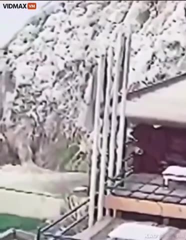 man pretending to jump from a cliff in an attempt to create a viral video ends up falling off