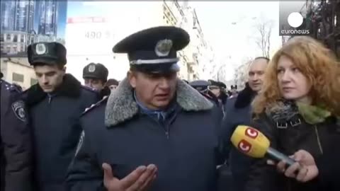Police defectors welcomed to Independence Square in Kyiv