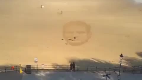 This is wonderful, as a Keir Starmer image emerges from the beach.
