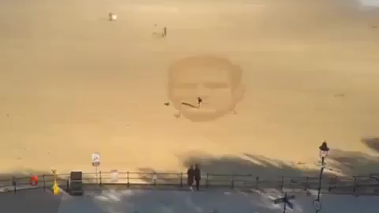 This is wonderful, as a Keir Starmer image emerges from the beach.