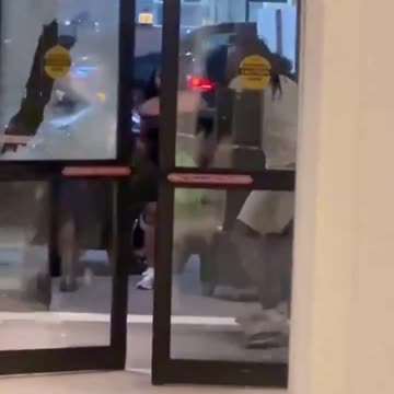 Drunk guy kicks in hotel front door