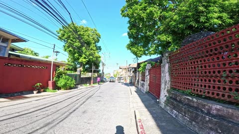 Happy Feeling on Calle Jose P. Rizal in Taal in Batangas in the Philippines
