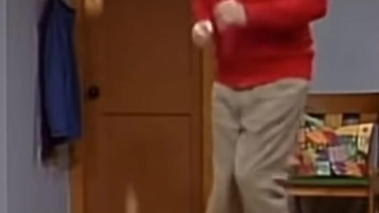 Mr Rogers dances as donuts rain from his ceiling