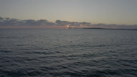 Sunset in an aerial shot over the sea