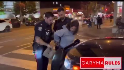 Liberal assualts Trump supporter right in front of police, arrested on spot