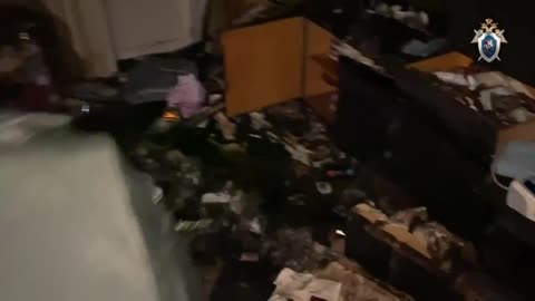 Former Russian Soldier Reenacts The Murder of His Two Roommates for Russian Police