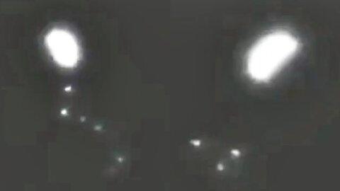 Egg Shaped UFO Caught On Camera Dropping Orbs