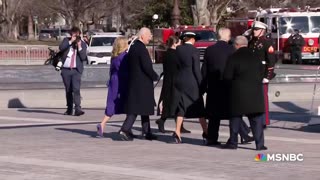 Former President Biden departs the Capitol.