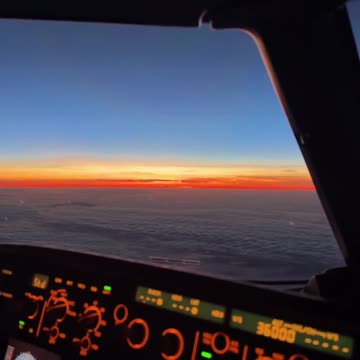 A beautiful video from the airplane cockpit at sunset