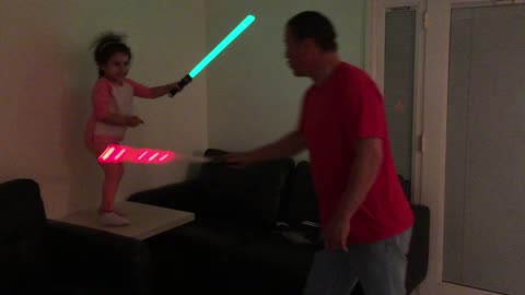 Fighting My Younger Daughter With a Lightsaber