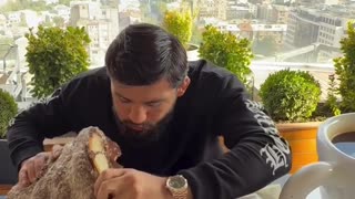 Arman Tsarukyan Eats a Giant Croissant