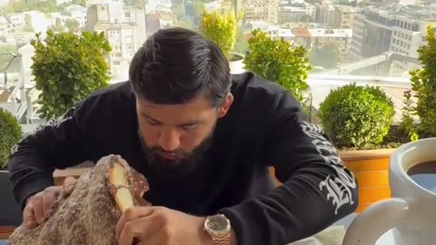Arman Tsarukyan Eats a Giant Croissant