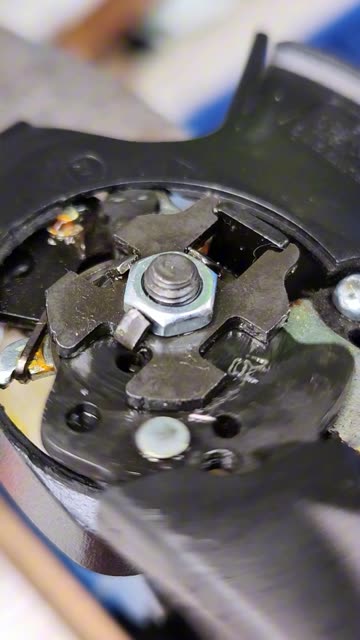 What does the inside of a bicycle gear shifter mechanism look like?