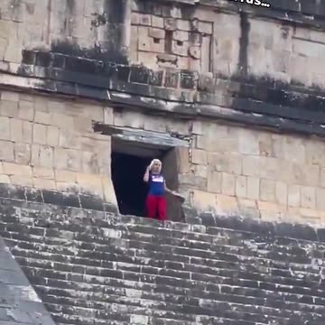 Angry crowd immediately jumps tourist for climbing ancient structure