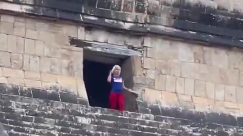 Angry crowd immediately jumps tourist for climbing ancient structure