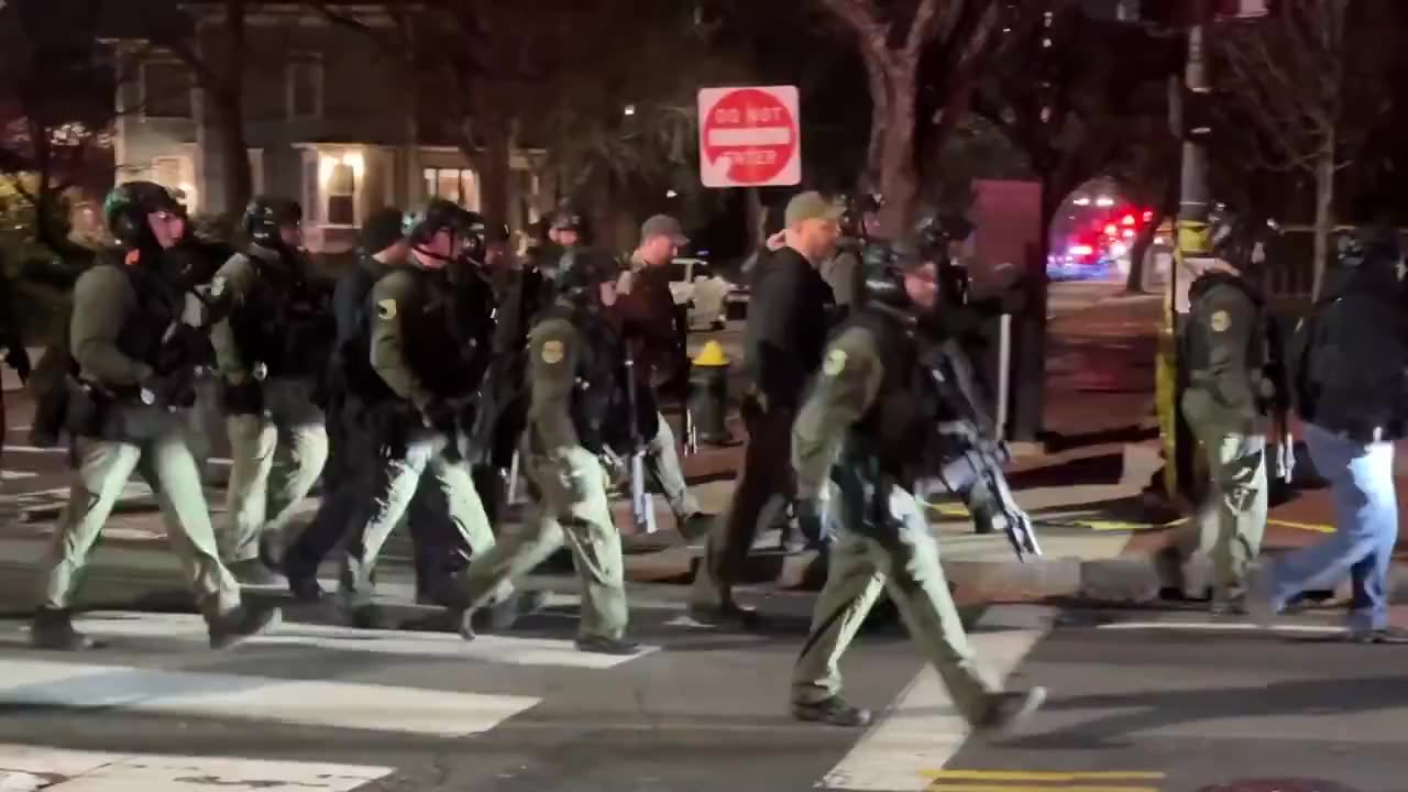 Police sweeping the streets of Brown University.