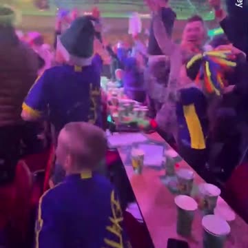 Coleen Rooney spils beer on herself after Luke Littler's win