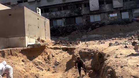 Al-Shifa Hospital in Gaza buries 11 unidentified martyrs after being unable to identify them