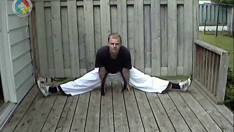 Warm-ups: 33-side-splits-on-heels-with-toes-pointing-up-front-view