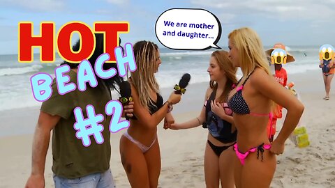 Mother and daughter enjoying the beach together.