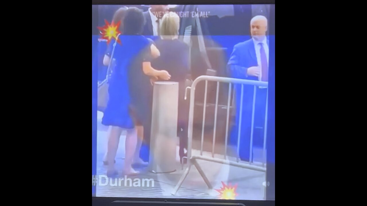 Hillary handcuffed and shoved into a van