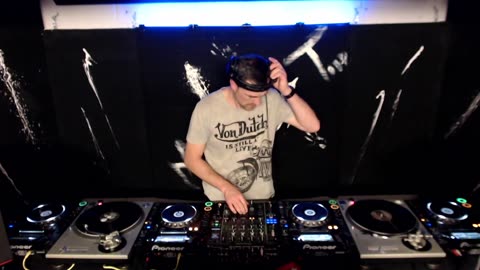DJ Mike Todd, mixing Techno. Playing with vinyl and digital.