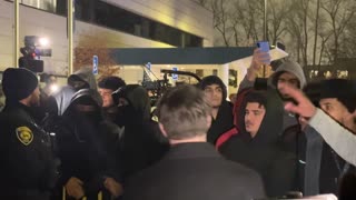 Even after he was brought into safety, people continued to shout profanities at him.