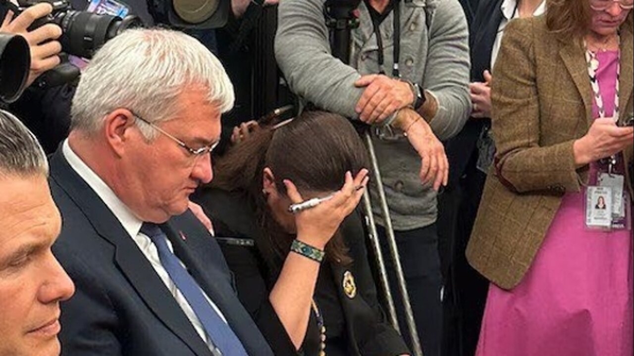 Torpedoing his own Ship-of-State. Ukrainian ambo facepalms as she watches her boss self-destruct.