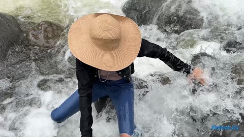 Wetlook girl in jeans, a denim jacket, and a T-shirt