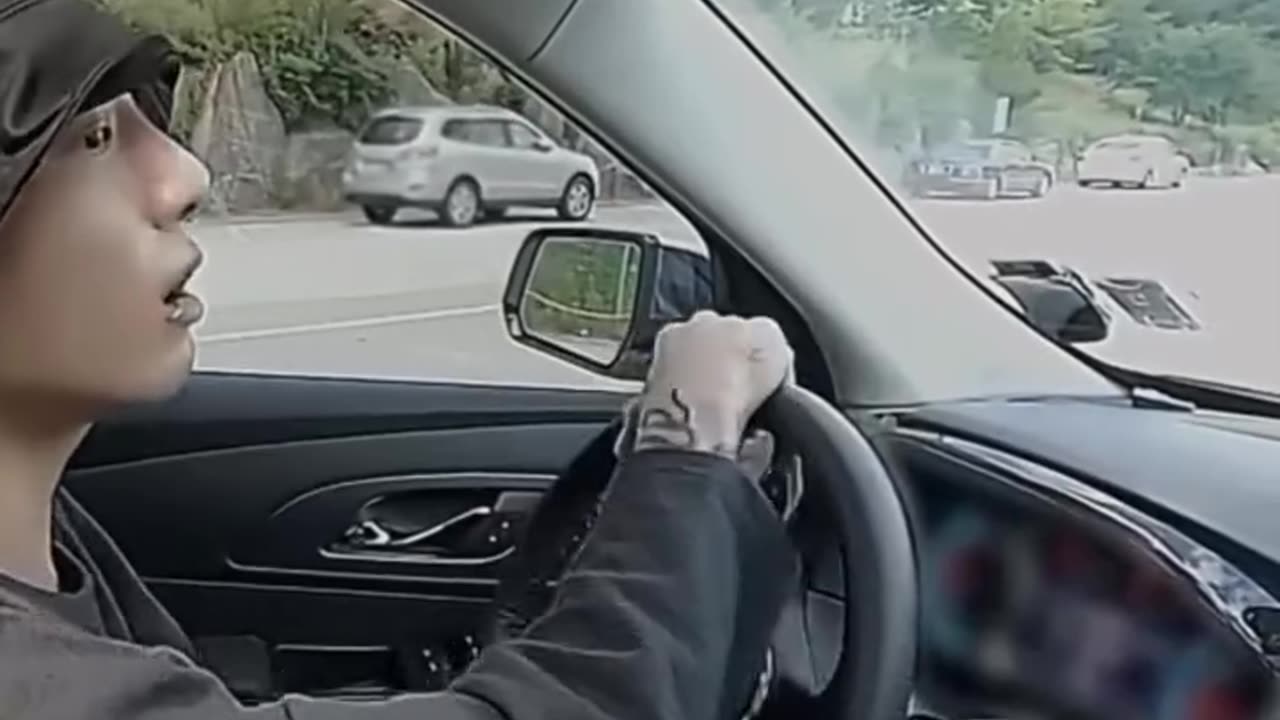 JEON JUNGKOOK OF BTS DRIVING A CAR đ